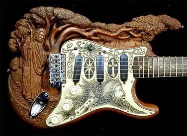 Jewelled Jesus Fender Stratocaster carved by Doug Rowell for Mike Deasy ...